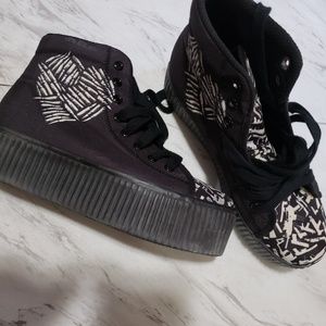 Platform sneakers with a bullet heart